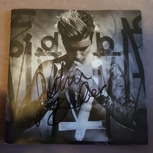 Justin Bieber signed cd booklet